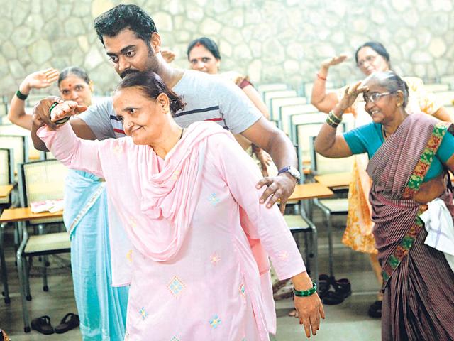 Senior citizens practise their dance steps at the geriatric centre at Tata Institute of Social Sciences. (Arijit Sen/HT photo)