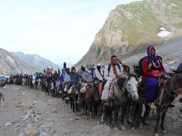 Harsh weather and tough terrain do not deter the spirit the pilgrims, who arrive in large number to pay obeisance at the Amarnath Shrine. Keshav Singh/HT