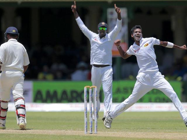 Sri Lanka's Dushmantha Chameera, right, celebrates the dismissal of India's Amit Mishra, left. (AP Photo)