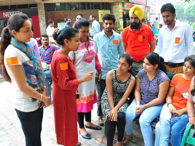Girls campaigning for their party at Student Center, Panjab University on Friday. Karun Sharma/HT