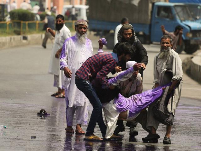Police used water cannon, batons and fired a few rounds of tear gas shells to disperse the protestors, who were irked after the police blocked the entrance to Geelani's residence at Hyderpora, where he was scheduled to address a party convention. Abid Bhat/HT