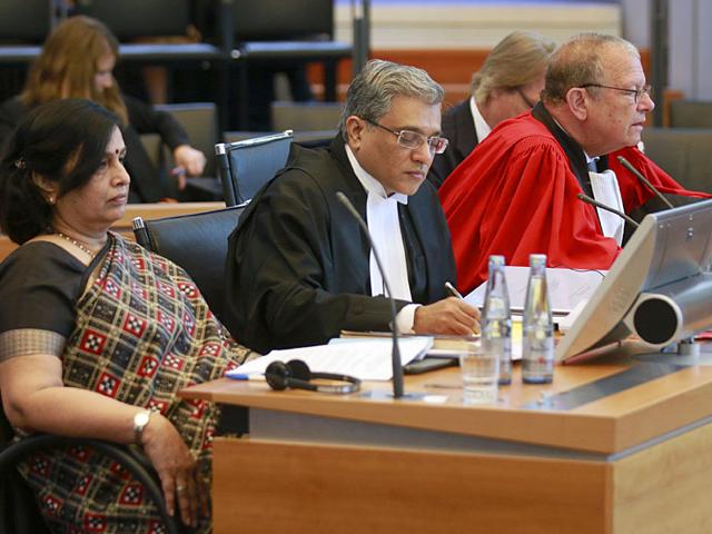 (From left) Agent of the Indian delegation, Neeru Chadha, co-agent and Ambassador of India to Germany Vijay Gokhale, and Counsel Alain Pellet at the first public hearing on a case involving two Italian marines in Germany earlier this month. The marines are accused of killing two Indian fisherman in 2012. (AP File Photo) (From left) Agent of the Indian delegation, Neeru Chadha, co-agent and Ambassador of India to Germany Vijay Gokhale, and Counsel Alain Pellet at the first public hearing on a case involving two Italian marines in Germany earlier this month. The marines are accused of killing two Indian fisherman in 2012. (AP File Photo)