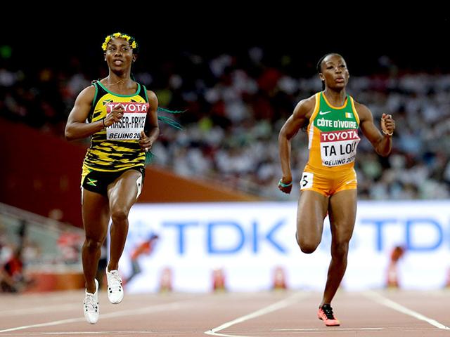 Jamaica's Shelly-Ann Fraser-Pryce, left, and Ivory Coast's Marie-Josee Ta Lou run in the women’s 100m semi-final at the World Athletics Championships at the Bird's Nest stadium, Beijing, on August 24, 2015. (AP Photo) Jamaica's Shelly-Ann Fraser-Pryce, left, and Ivory Coast's Marie-Josee Ta Lou run in the women’s 100m semi-final at the World Athletics Championships at the Bird's Nest stadium, Beijing, on August 24, 2015. (AP Photo)