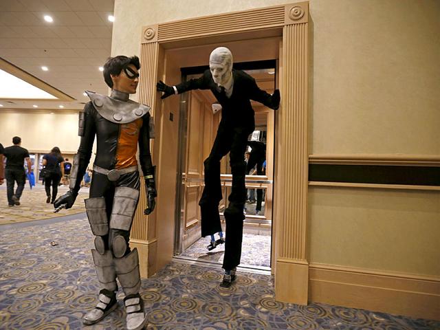 #Shudders. Did we just spot a Slenderman walk out of the elevator? (Reuters/ Jim Young) #Shudders. Did we just spot a Slenderman walk out of the elevator? (Reuters/ Jim Young)