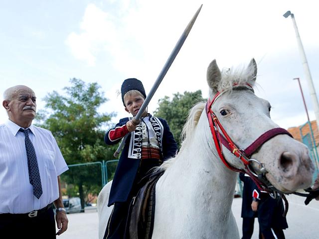 Alkar Vito poses for a picture on a horse before the Children's Alka competition in Croatia. (Reuters)