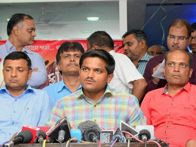 Hardik Patel, Convenor of Patidar Andolan Samiti speaks during a mega rally in Ahmadabad.(AP Photo) Hardik Patel, Convenor of Patidar Andolan Samiti speaks during a mega rally in Ahmadabad.(AP Photo)