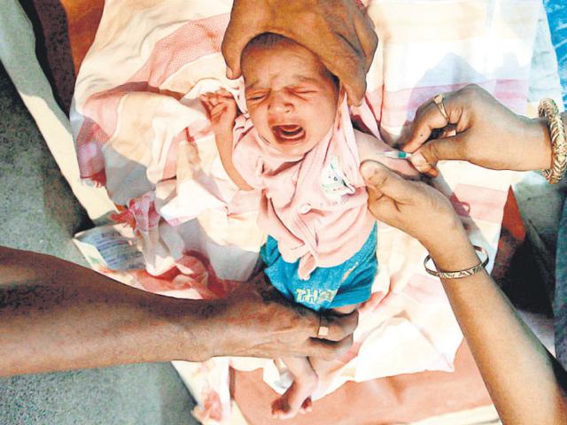 The achievements under Mission Indradhanush, one of the world’s largest immunisation drives to cover all unvaccinated and partially vaccinated children, reflect our commitment towards ensuring that no child is left without the protection of full immunisation. (Reuters Photo) The achievements under Mission Indradhanush, one of the world’s largest immunisation drives to cover all unvaccinated and partially vaccinated children, reflect our commitment towards ensuring that no child is left without the protection of full immunisation. (Reuters Photo)