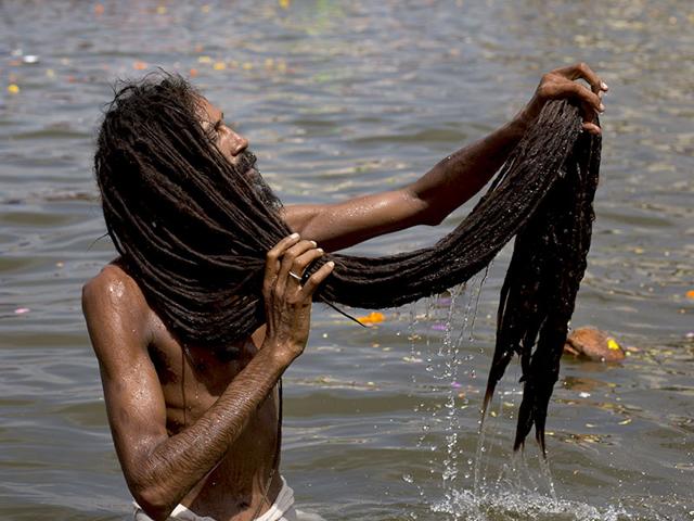 Ash smeared sadhus standing on one leg or lying on a bed of nails while subsisting on leaves, pilgrims who immerse themselves at the Sangam to wash away their sins, attain moksh and be free of the wretchedness of repeated rebirth, unfortunate stampedes that kill hundreds, colour, vibrancy and a desperate yearning to reach out to the Unknowable, the Kumbh Mela. (AP Photo) Ash smeared sadhus standing on one leg or lying on a bed of nails while subsisting on leaves, pilgrims who immerse themselves at the Sangam to wash away their sins, attain moksh and be free of the wretchedness of repeated rebirth, unfortunate stampedes that kill hundreds, colour, vibrancy and a desperate yearning to reach out to the Unknowable, the Kumbh Mela. (AP Photo)