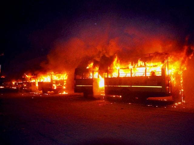 Buses set on fire in Surat as the Patel community was enraged after Hardik Patel, convener of Patidar Anamat Andolan Samiti, was detained on Tuesday. (PTI Photo)