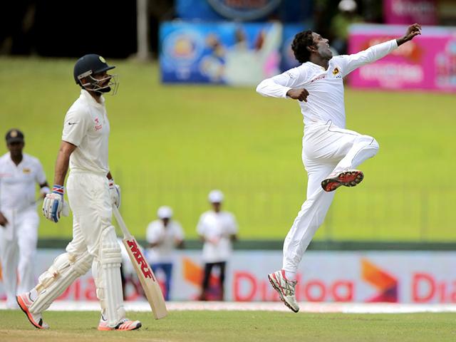Sri Lankan captain Angelo Mathews, right, celebrates Kohli's dismissal. (AP Photo)