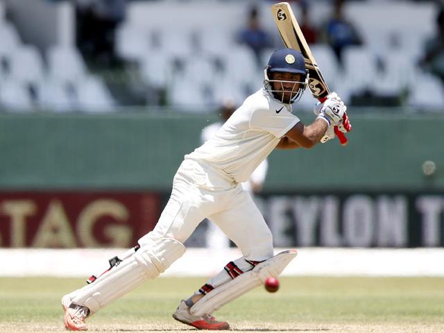 India's Cheteshwar Pujara plays a shot during the second day of the third and final Test match against Sri Lanka at the SSC ground in Colombo, on August 29, 2015. (Reuters Photo)