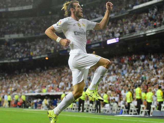 Real Madrid's Welsh forward Gareth Bale celebrates scoring his second goal during the La Liga match against Real Betis at the Santiago Bernabeu stadium in Madrid, on August 29, 2015. (AFP Photo) Real Madrid's Welsh forward Gareth Bale celebrates scoring his second goal during the La Liga match against Real Betis at the Santiago Bernabeu stadium in Madrid, on August 29, 2015. (AFP Photo)