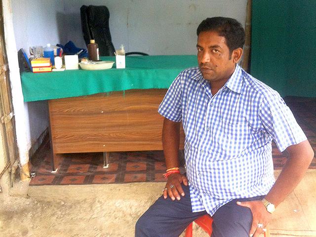 Amresh Kumar sits in front of his rural clinic in Samastipur. He is unhappy with Nitish Kumar but will vote for him because of caste. (Prashant Jha/HT Photo)