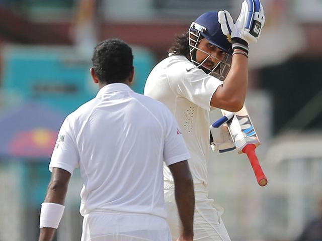 Sri Lankan bowler Dhammika Prasad and India's Ishant Sharma exchange words on day four of the third Test match in Colombo. (AP Photo) Sri Lankan bowler Dhammika Prasad and India's Ishant Sharma exchange words on day four of the third Test match in Colombo. (AP Photo)