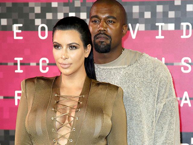 Kim Kardashian and musician Kanye West kept their style statements simple. So that West could save the best for the stage: He said he's running for President in 2020, and that he smoked pot before coming on stage. (Reuters photo)
