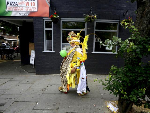 A man in costume arrives at the Notting Hill Carnival in London, Britain, August 30, 2015. (Reuters)