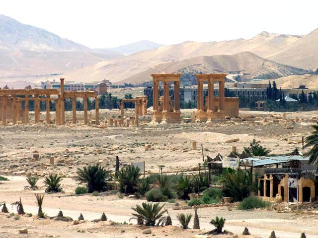 This file photo released by the Syrian official news agency SANA shows the general view of the ancient Roman city of Palmyra, northeast of Damascus, Syria. (SANA via AP, File) This file photo released by the Syrian official news agency SANA shows the general view of the ancient Roman city of Palmyra, northeast of Damascus, Syria. (SANA via AP, File)