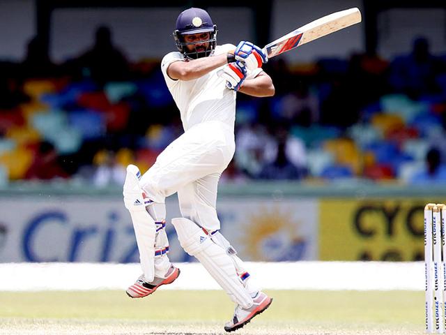 India's Rohit Sharma plays a shot during his knock of 50 off 72 deliveries. (Reuters Photo)