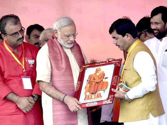 Prime Minister Narendra Modi at the Bhagalpur rally ahead of the upcoming Bihar elections. He attempted to improve the NDA's electoral prospects in a region where it faces its toughest challenge. (Santosh Kumar/ HT Photo)