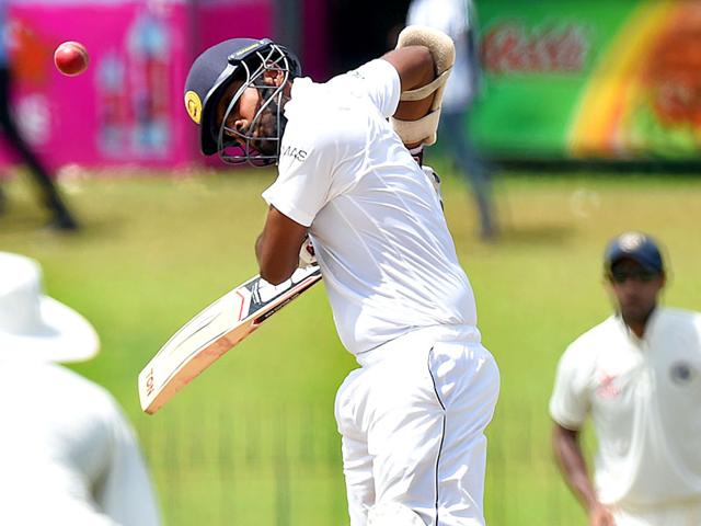 Sri Lanka's Lahiru Thirimanne avoids a bouncer off the bowling of India's Ishant Sharma. (AFP Photo)