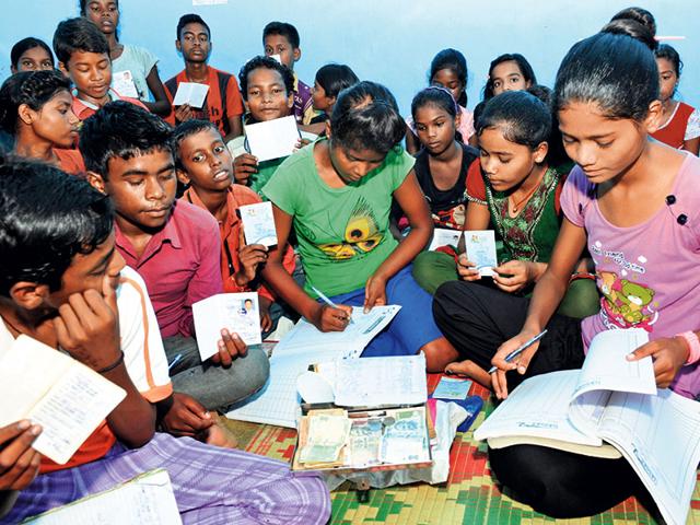 Opened in 2014 and managed entirely by children, the bank now has 130 accounts of children aged between 9 and 18 years in its Ranchi branch in slums of Jagannathpur. (HT Photo)