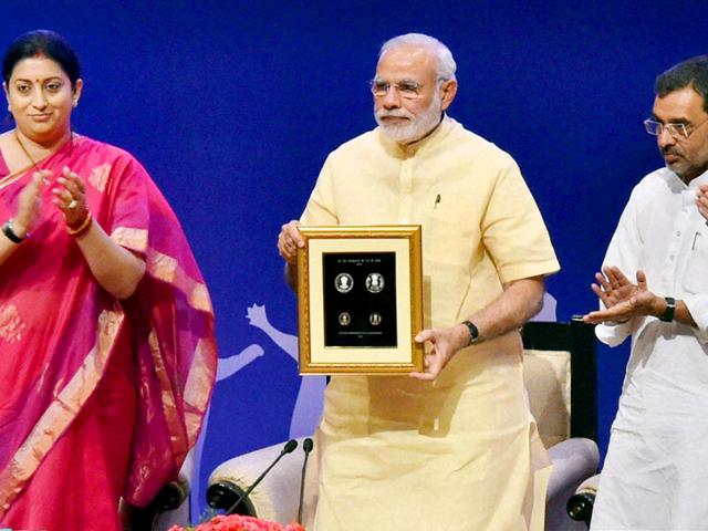 Prime Minister Narendra Modi releasing commemorative coins of rupees 125 and rupees 10 to mark the 125th birth anniversary of Dr Sarvepalli Radhakrishnan on the eve of Teacher's Day at Manekshaw Centre in New Delhi on Friday. Prime Minister Narendra Modi releasing commemorative coins of rupees 125 and rupees 10 to mark the 125th birth anniversary of Dr Sarvepalli Radhakrishnan on the eve of Teacher's Day at Manekshaw Centre in New Delhi on Friday.