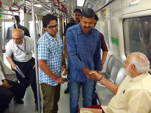 Prime Minister Narendra Modi travels by Delhi Metro to inaugurate the extension of the Badarpur Line that will connect the satellite city of Faridabad to the national capital. (Photo courtesy: @PMOIndia) Prime Minister Narendra Modi travels by Delhi Metro to inaugurate the extension of the Badarpur Line that will connect the satellite city of Faridabad to the national capital. (Photo courtesy: @PMOIndia)