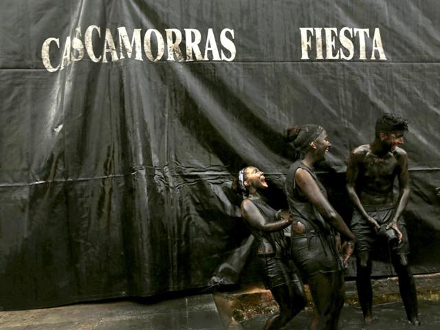 Revellers covered in grease take part in the annual Cascamorras festival in Baza, southern Spain. (Reuters Photo)