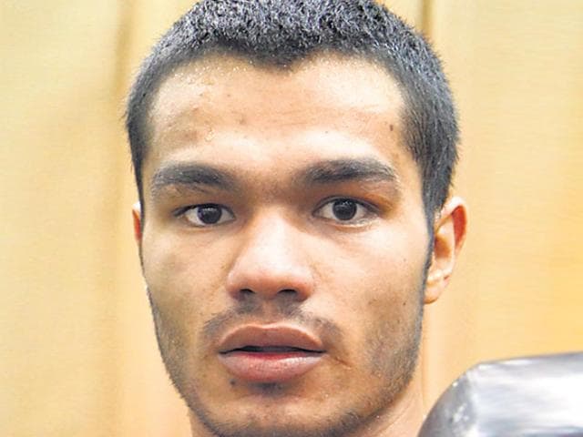 Indian boxer Vikas Krishan (75kg) fought his heart out but still fell short as he settled for the silver medal after going down to Uzbekistan's Bektemir Melikuziev in a brutal summit clash of the Asian Championships. (HT file photo)