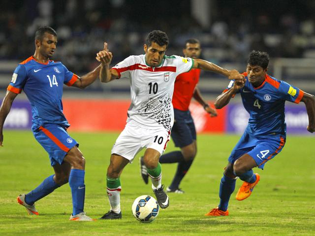 Iranian players Omid Ebrahimi (L) and Captain Andranik Teymourian (R) vie for the ball with Indian Captain Sunil Chhetri (C) during the Asia Group D FIFA World Cup 2018 qualifying football match between India and Iran at The Sree Kanteerawa Stadium in Bangalore (AFP Photo) Iranian players Omid Ebrahimi (L) and Captain Andranik Teymourian (R) vie for the ball with Indian Captain Sunil Chhetri (C) during the Asia Group D FIFA World Cup 2018 qualifying football match between India and Iran at The Sree Kanteerawa Stadium in Bangalore (AFP Photo)