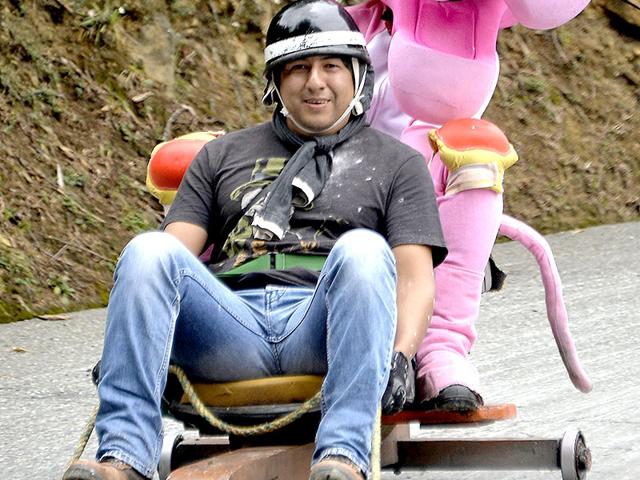 How about a Pink Panther for company? A participant in a homemade car during the XXVI Car Festival. (AFP)