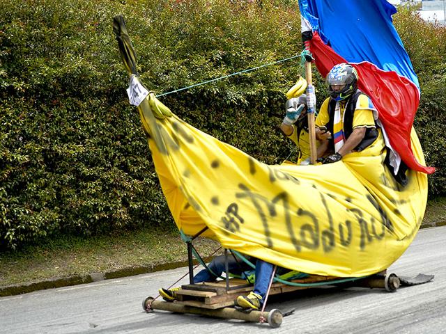 Colombia's famed Car Festival, in its 26th year, saw people build their own cars on September 6. Seen here is a homemade banana-shaped car. (AFP)