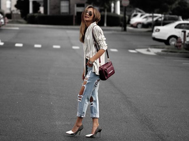 Be it skinny, mom, boyfriend or cropped, ripped jeans are the hot new denim trend du jour. You don't need to think twice before pairing it with a white top. Be it skinny, mom, boyfriend or cropped, ripped jeans are the hot new denim trend du jour. You don't need to think twice before pairing it with a white top.