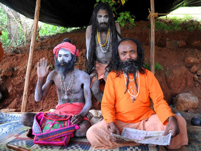 Ash-smeared naga sadhus gear up for the second 'shahi snaan' (holy bath) in river Godavari during the ongoing Kumbh Mela, in Nashik. (Anshuman Poyrekar/HT photo) Ash-smeared naga sadhus gear up for the second 'shahi snaan' (holy bath) in river Godavari during the ongoing Kumbh Mela, in Nashik. (Anshuman Poyrekar/HT photo)