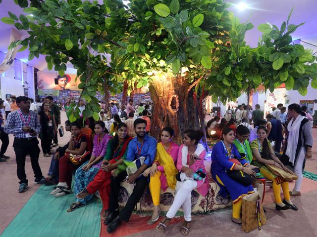 Participants sitting under the replica of Bodhi Tree at the venue of 10th World Hindi Conference in Bhopal. (Praveen Bajpai/HT photo)