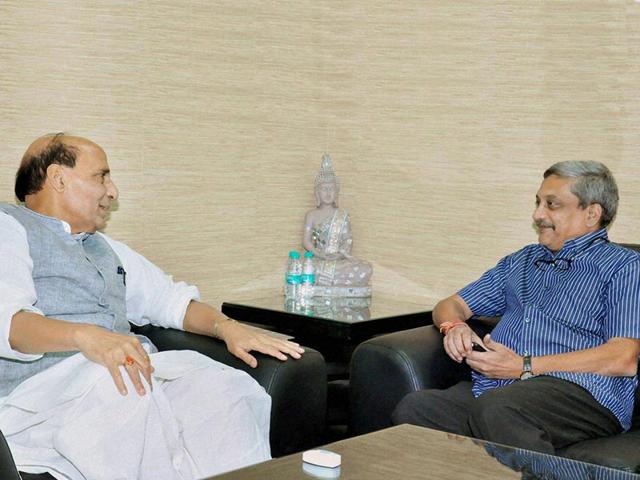 Union home minister Rajnath Singh with defence minister Manohar Parrikar during a meeting in New Delhi (PTI Photo)