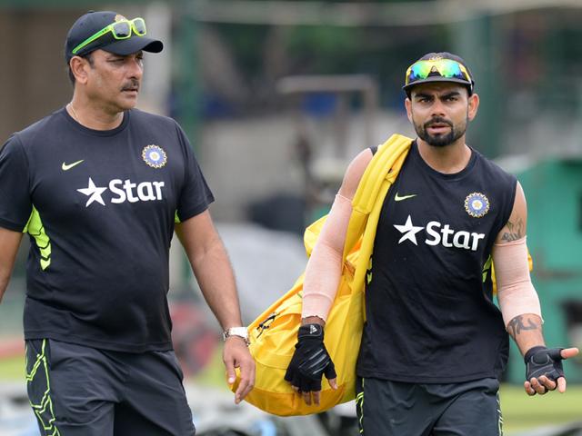 Team India director Ravi Shastri and India Test captain Virat Kohli during a practice session in Colombo in August. (AFP Photo) Team India director Ravi Shastri and India Test captain Virat Kohli during a practice session in Colombo in August. (AFP Photo)
