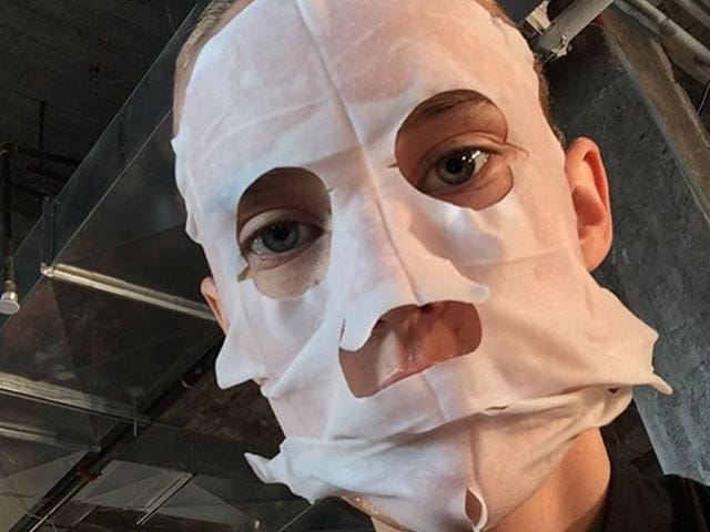 Model Harleth Kuusik marks the first day of Fashion Week by posing backstage in a glamorous face mask. (Instagram)