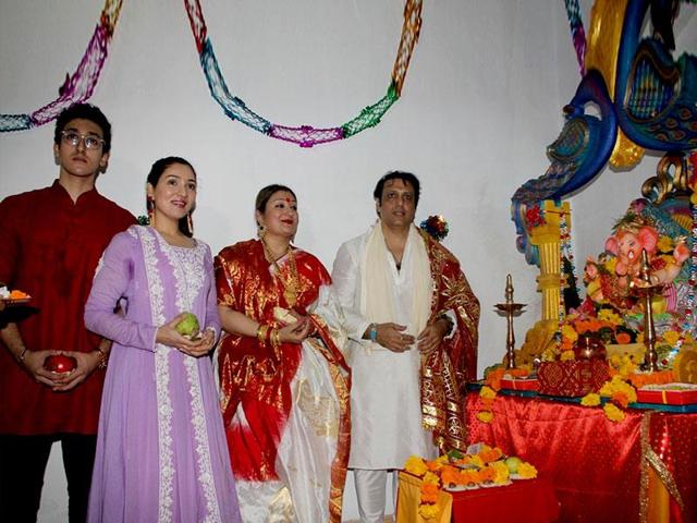 Govinda celebrates Ganesh Chaturthi with his family in Mumbai, on Sep 17, 2015. (Photo: IANS) Govinda celebrates Ganesh Chaturthi with his family in Mumbai, on Sep 17, 2015. (Photo: IANS)