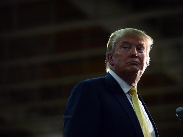 Republican Presidential candidate Donald Trump listens to a question during a town hall event in Rochester, New Hampshire. Trump, has repeatedly proposed building a wall along the entire border with Mexico. (AFP) Republican Presidential candidate Donald Trump listens to a question during a town hall event in Rochester, New Hampshire. Trump, has repeatedly proposed building a wall along the entire border with Mexico. (AFP)