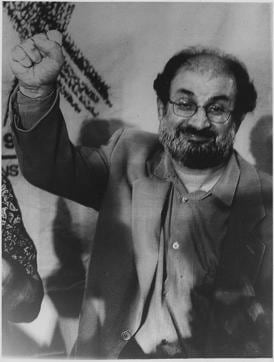 A file photo from 25.09.98: London British Author Salman Rushdie Raises his hand in Triumph at a Press Conference in London Iran said it will distance itself from the 2.5 dollars million reward for Killing Rushdie The Author of the Controversial Book the Satanic verses (PTI) A file photo from 25.09.98: London British Author Salman Rushdie Raises his hand in Triumph at a Press Conference in London Iran said it will distance itself from the 2.5 dollars million reward for Killing Rushdie The Author of the Controversial Book the Satanic verses (PTI)