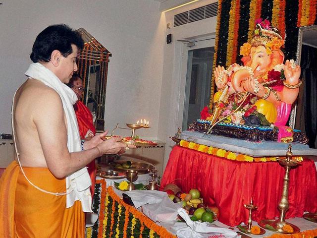 Bollywood actor Jeetendra offers prayers to Lord Ganesh during the Ganesh Chaturthi celebrations in Mumbai on Friday. (pti) Bollywood actor Jeetendra offers prayers to Lord Ganesh during the Ganesh Chaturthi celebrations in Mumbai on Friday. (pti)
