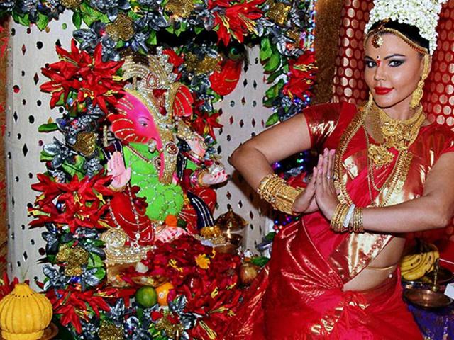 Rakhi Sawant poses for shutterbugs on Ganesh Chaturthi celebrations in Mumbai on Friday. (pti) Rakhi Sawant poses for shutterbugs on Ganesh Chaturthi celebrations in Mumbai on Friday. (pti)