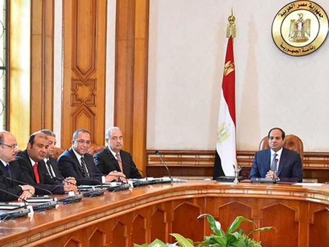 Egyptian President Abdel Fattah al-Sisi (R) meets with his ministers at the presidential palace in Cairo in this September 19, 2015 handout picture courtesy of the Egyptian Presidency. (Reuters) Egyptian President Abdel Fattah al-Sisi (R) meets with his ministers at the presidential palace in Cairo in this September 19, 2015 handout picture courtesy of the Egyptian Presidency. (Reuters)