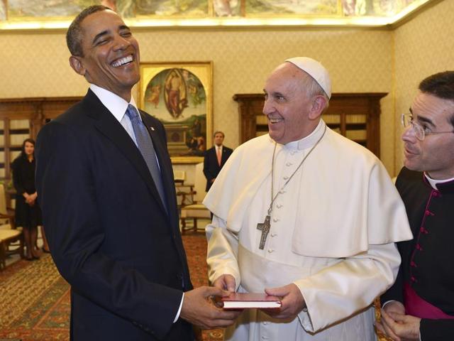 In this March 27, 2014 file photo, Pope Francis and President Barack Obama smile as they exchange gifts, at the Vatican. (AP Photo) In this March 27, 2014 file photo, Pope Francis and President Barack Obama smile as they exchange gifts, at the Vatican. (AP Photo)