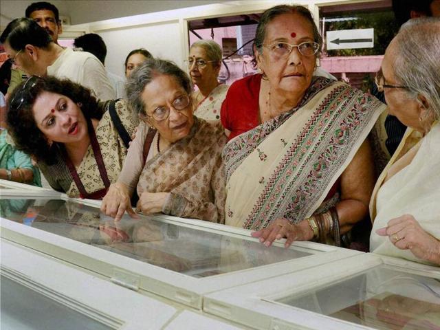 Netaji Subhash Chandra Bose's family members examine declassified files on the freedom fighter at Kolkata Police Museum on Friday. The batch of 64 files contained quite a few indications that Bose may have survived a purported air crash in 1945 but offered no conclusive proof. (PTI)