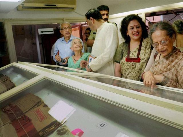 Bose’s family members smile as they take a look at declassified files on the freedom fighter. Many of the files contained evidence of widespread and continuous surveillance on anybody connected with Bose. (PTI)
