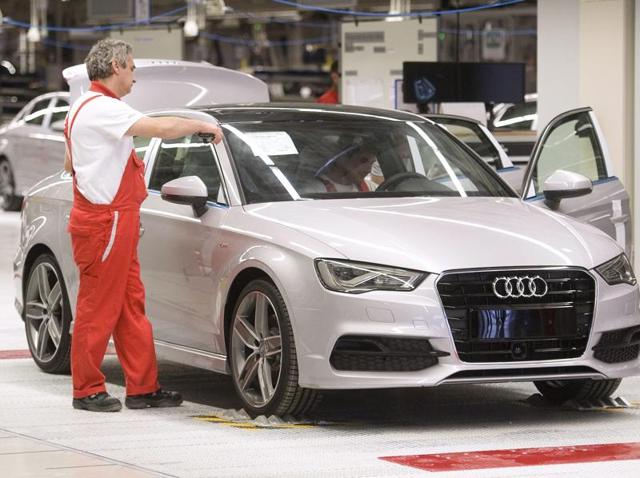 Audi employees work on an Audi A3 limousine on the assembly line at Audi's production site in Gyor, Hungary, 12 June 2013. The US Evironmental Protection Agency (EPA) on 18 September 2015 ordered Volkswagen to recall nearly half a million four cylinder diesel cars from both Audi and VW. (EPA Photo) Audi employees work on an Audi A3 limousine on the assembly line at Audi's production site in Gyor, Hungary, 12 June 2013. The US Evironmental Protection Agency (EPA) on 18 September 2015 ordered Volkswagen to recall nearly half a million four cylinder diesel cars from both Audi and VW. (EPA Photo)