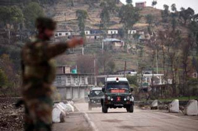 A soldier guides an army vehicle for Indo-Pak flag meeting arranged to defuse tension along the Line of Control (LoC) at the Chakan Da Bagh in Poonch near Jammu. (Afp file photo) A soldier guides an army vehicle for Indo-Pak flag meeting arranged to defuse tension along the Line of Control (LoC) at the Chakan Da Bagh in Poonch near Jammu. (Afp file photo)