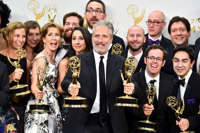 Jon Stewart and the cast and crew, winners of the award for outstanding variety talk series for The Daily Show with Jon Stewart. (AP) Jon Stewart and the cast and crew, winners of the award for outstanding variety talk series for The Daily Show with Jon Stewart. (AP)